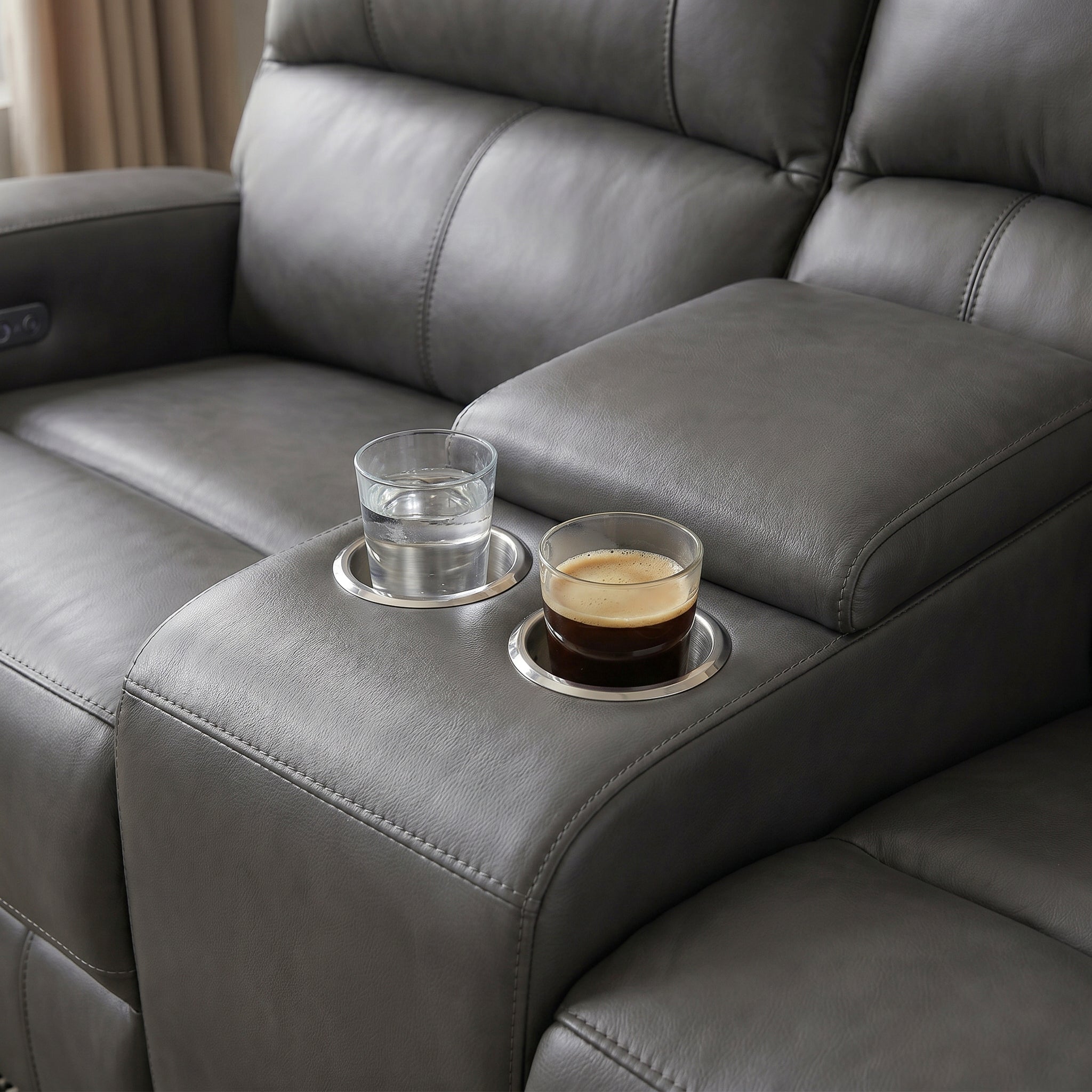 Integrated cup holder keeps your drinks securely within easy reach.