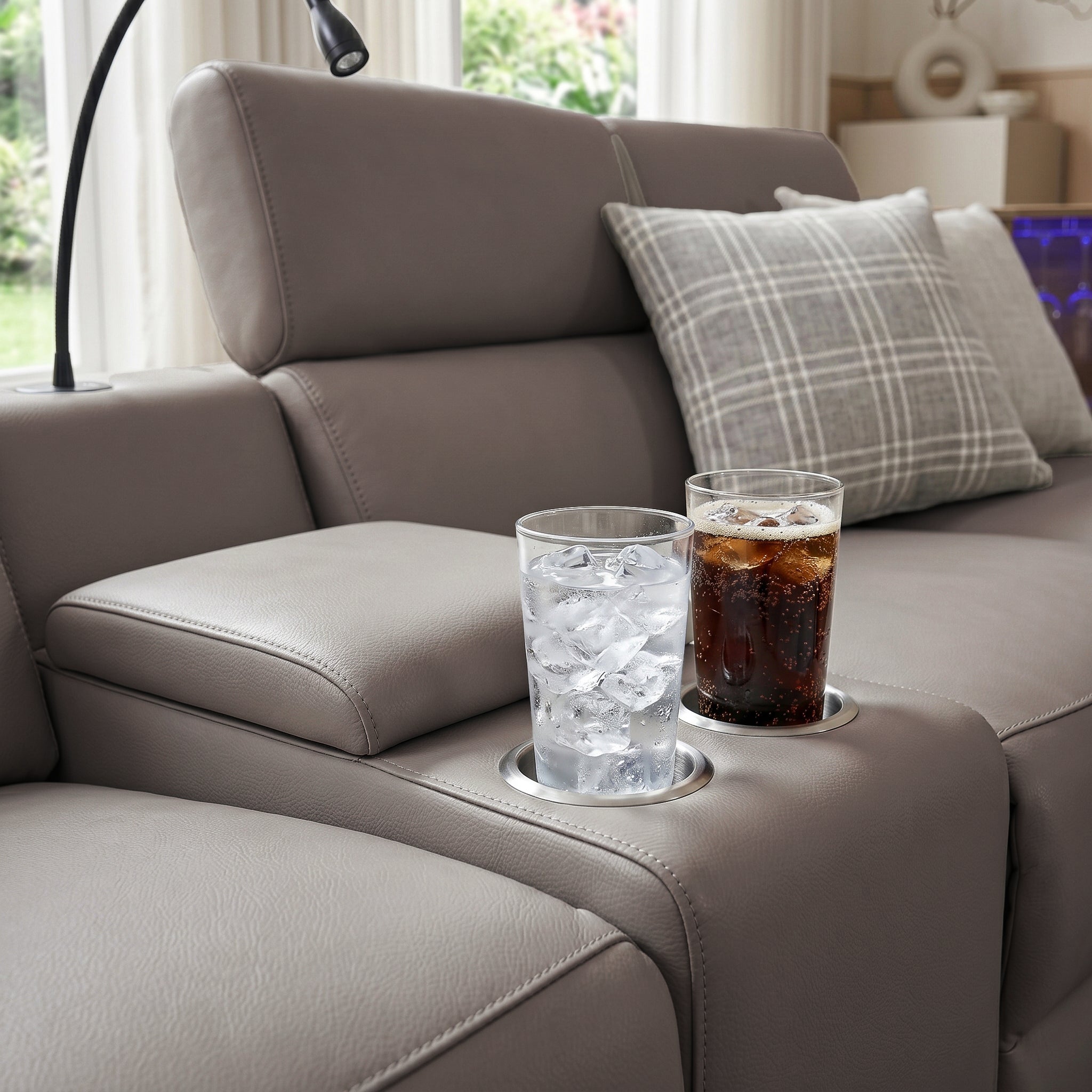 Integrated cup holder keeps your drinks securely within easy reach.