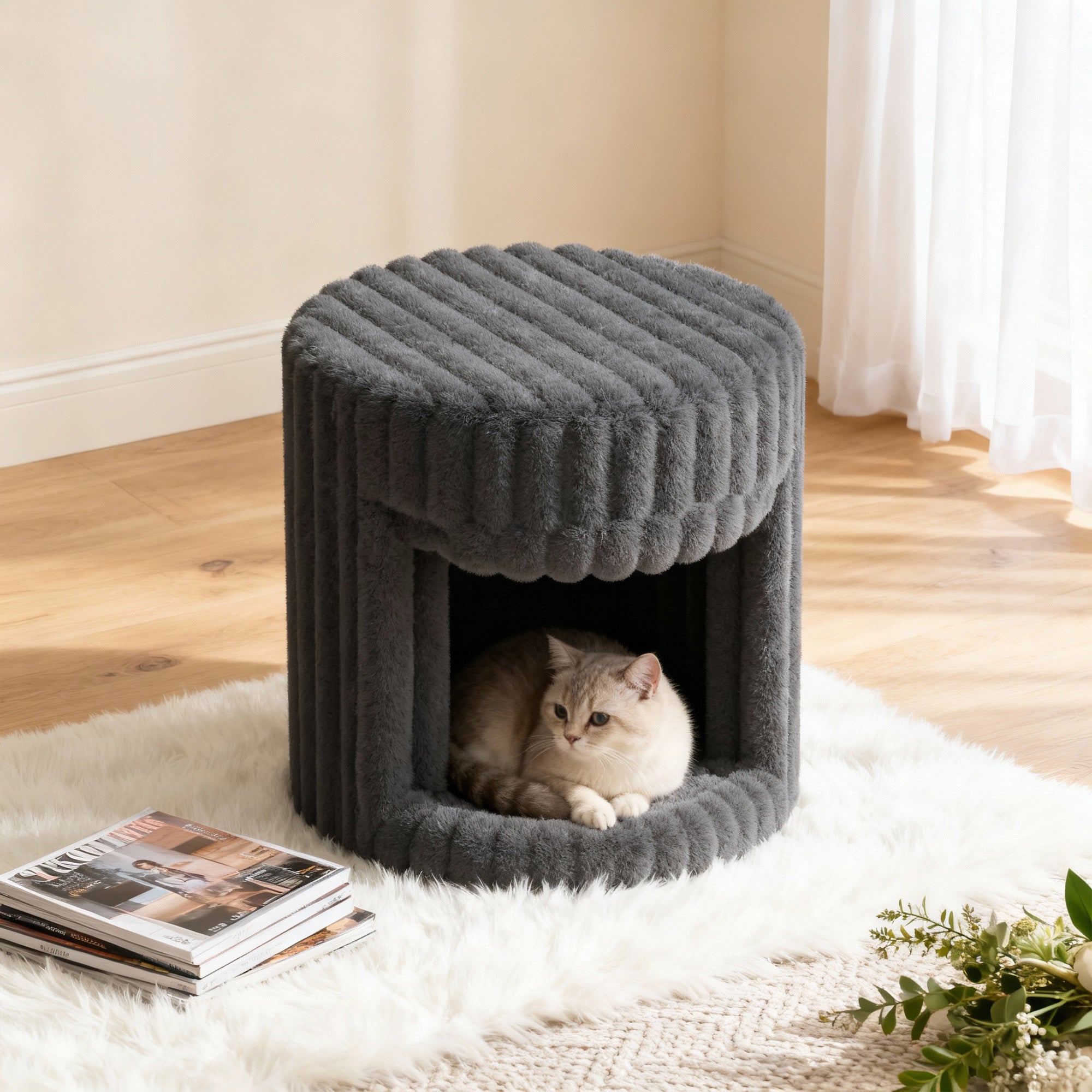 In the VANITII Grey Rabbit Hair Cat Bed, there is a little cat lying inside.It is placed in the bedroom,being both beautiful and practical.