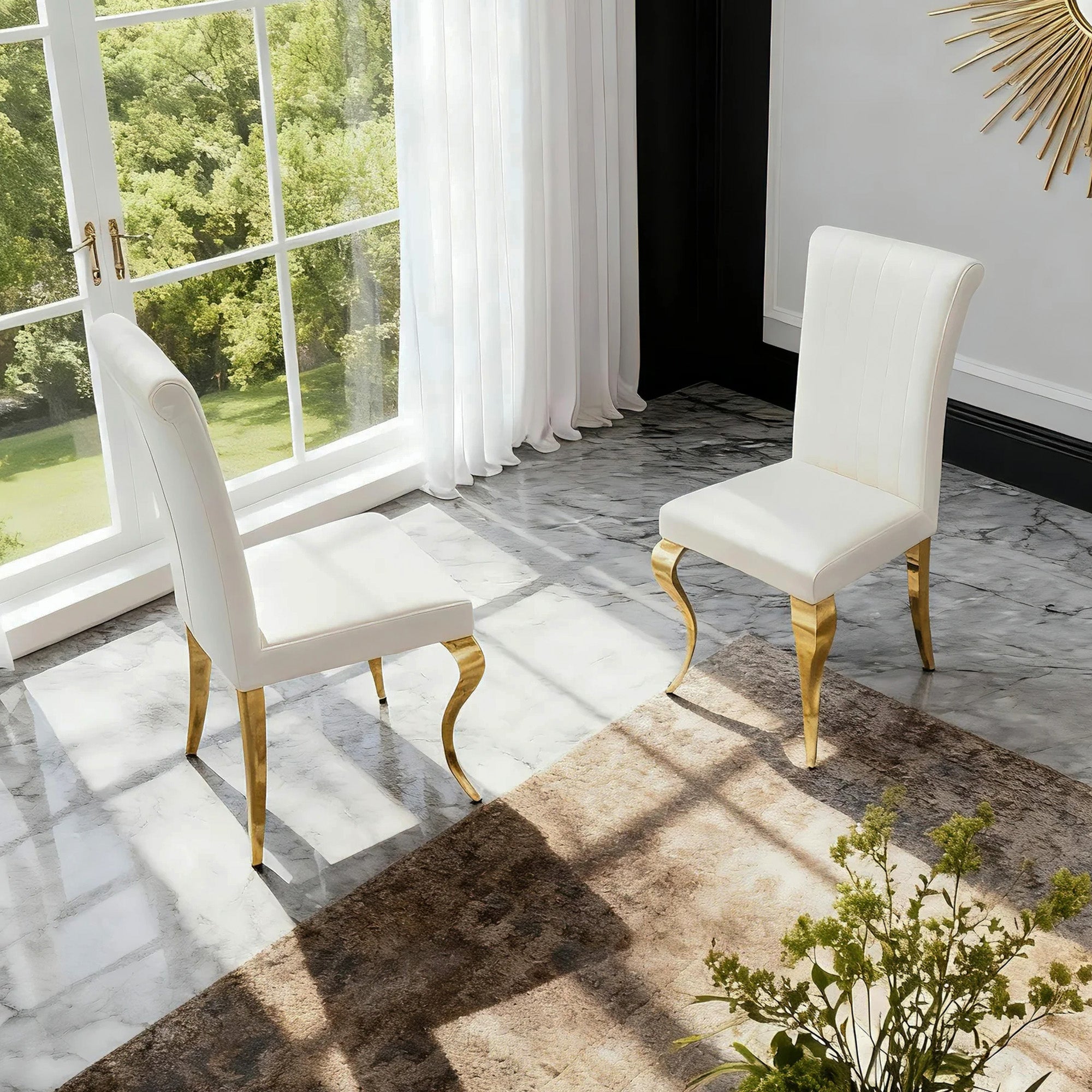 White Fabric Modern Gold Dining Chair is placed in the dining room,being both beautiful and practical.